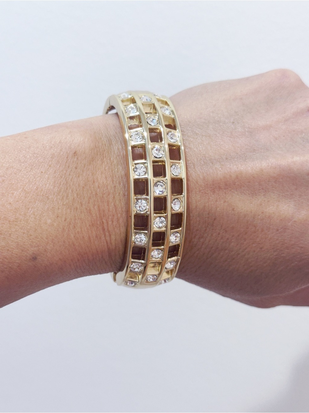 Chunky gold tone open weave rhinestone cuff bracelet